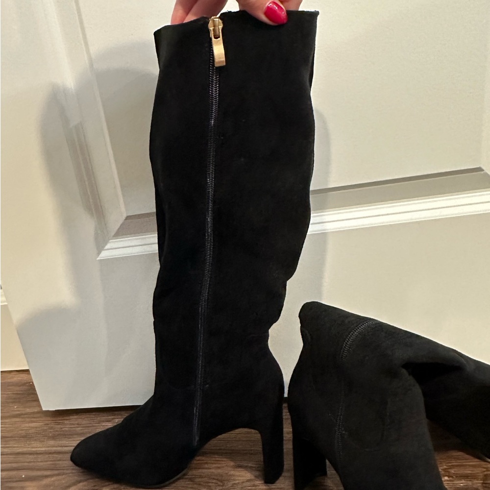 Black high heeled boots